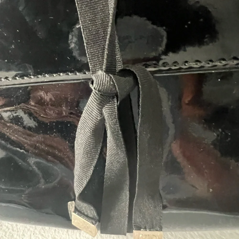 Dior Glossy Black Makeup Bag with Ribbon Detail.